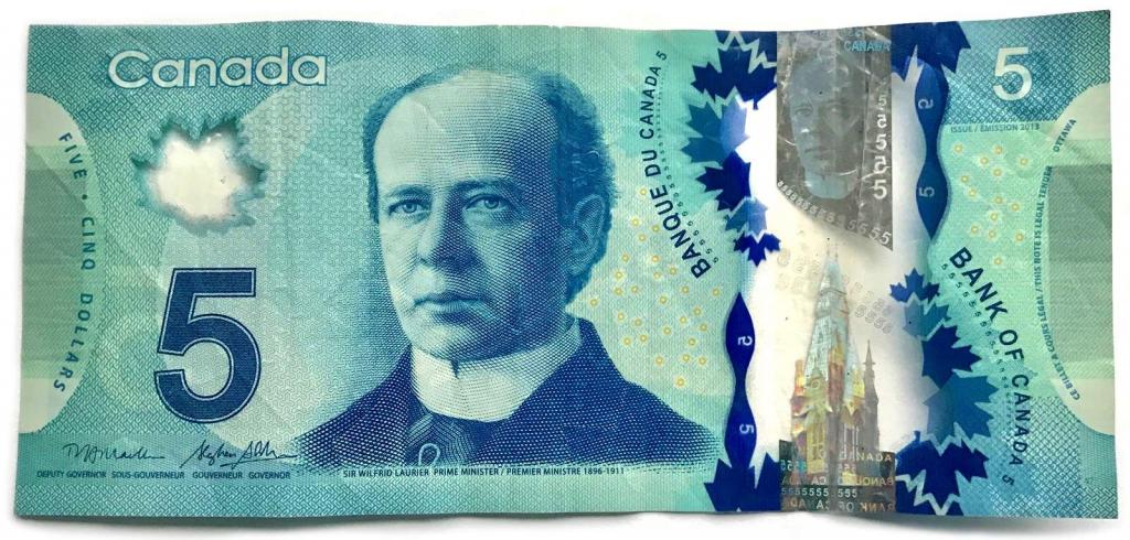 Канадский доллар фото